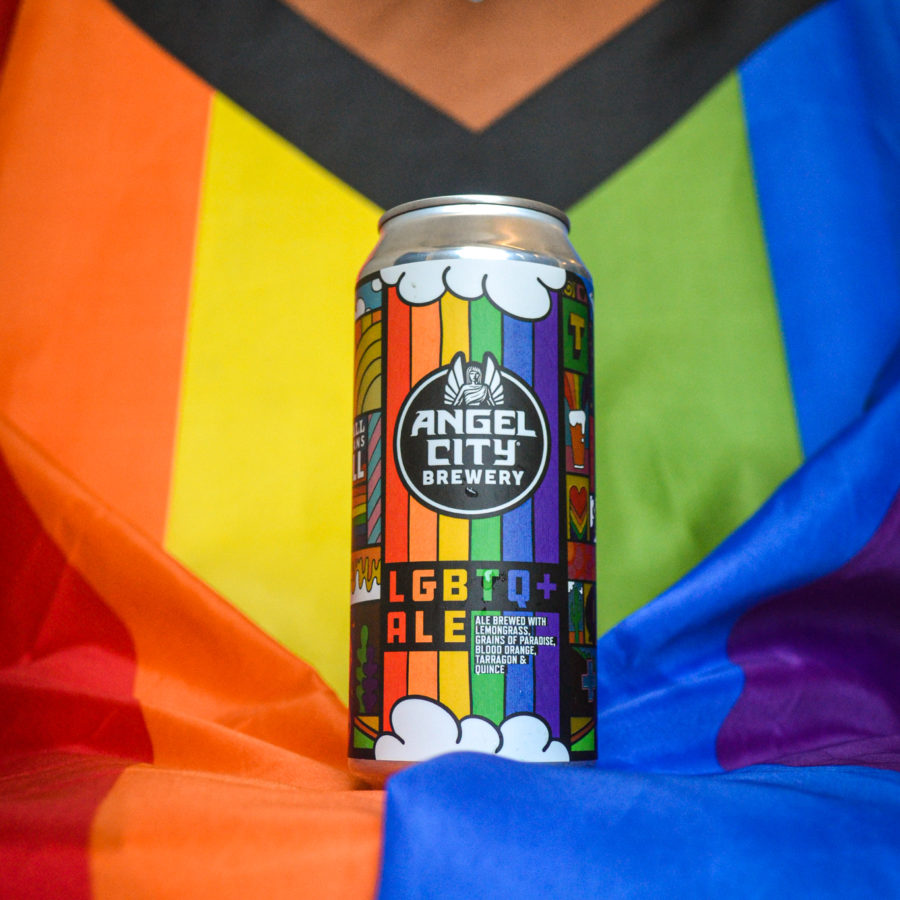 16oz can of beer with a pride flag in the backdrop