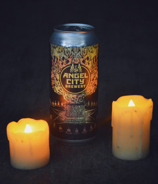 Can of Saisonic Ritual next to candles
