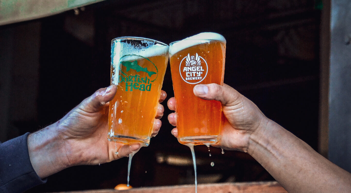 Cheersing with a couple of pints of "Juicy Deets" a collaboraiton between Dogfish Head Craft Brewery and Angel City Brewery