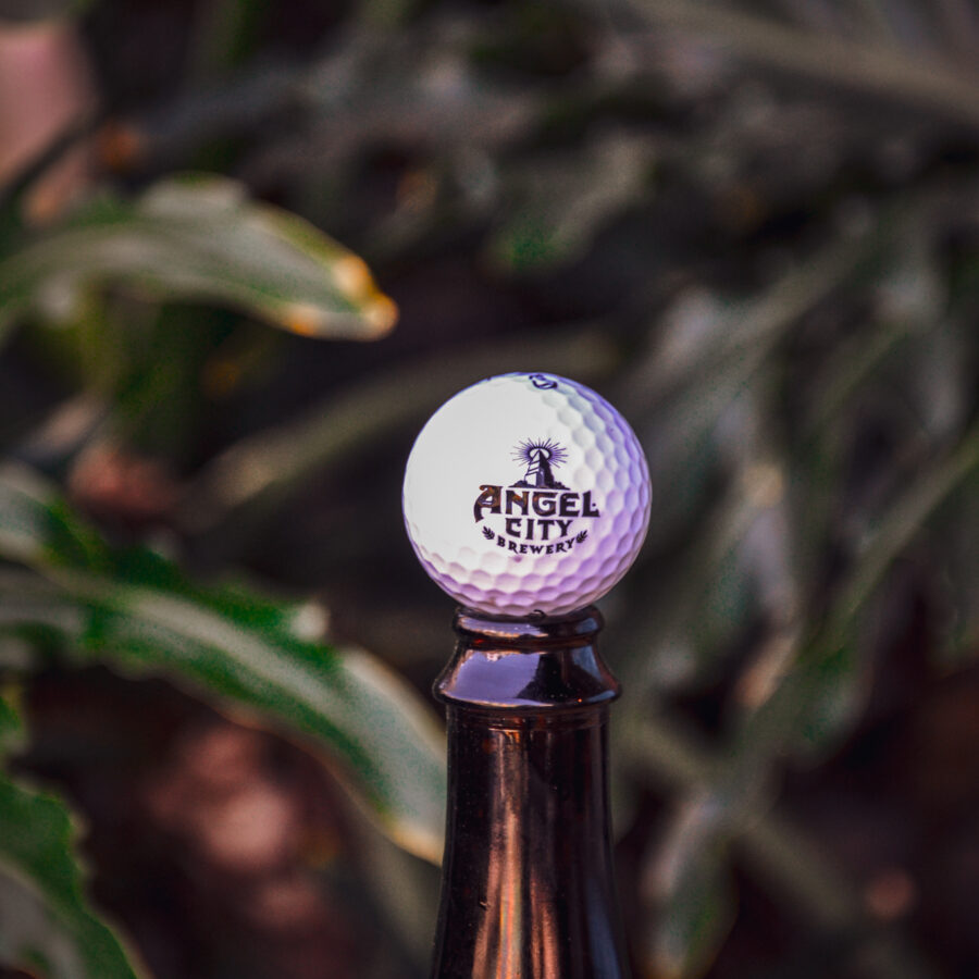 An Angel City Brewery branded golf ball